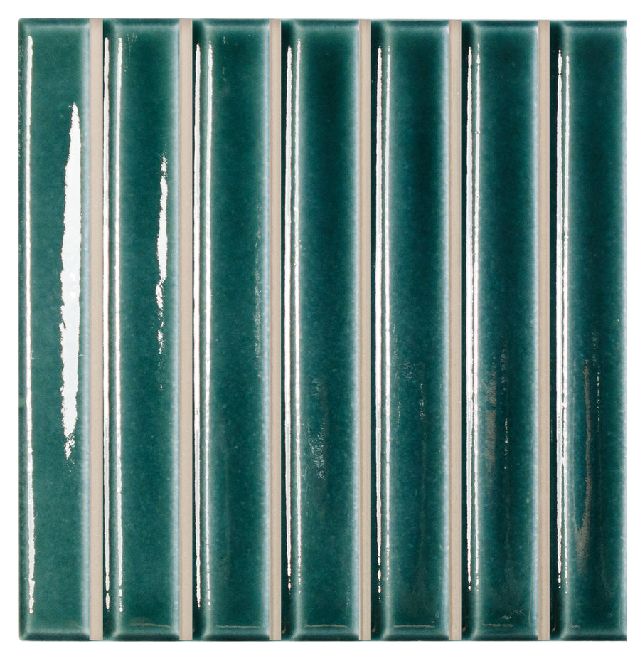 The Astria 4.6" x 4.6" Deco Ceramic Tile in Teal Glossy features even vertical ridges for a textured, three-dimensional striped look—ideal for backsplashes or accent walls.