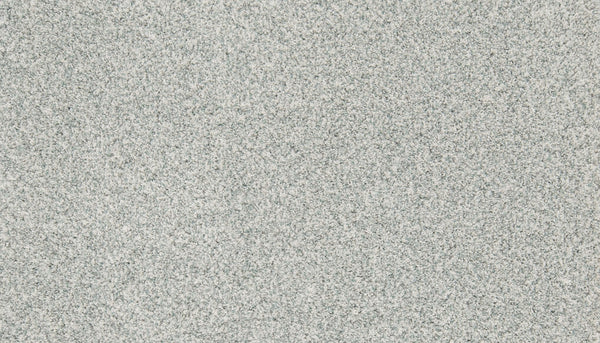 Close-up of Aurora Lights Family Friendly Carpet in light gray, featuring a textured, speckled pattern with small flecks—an elegant, durable option for luxury home interiors.