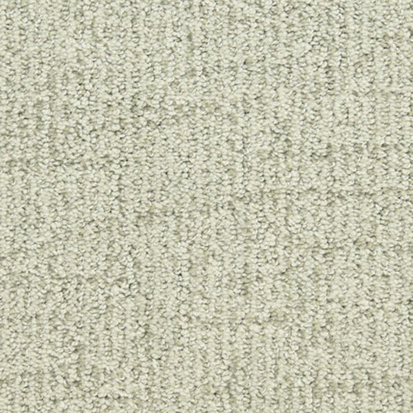 Close-up of Victor Family Friendly Carpet in Award Winner color, featuring a light beige tone with a subtle linear pattern and tightly woven looped fibers for a soft, durable, family-friendly surface.