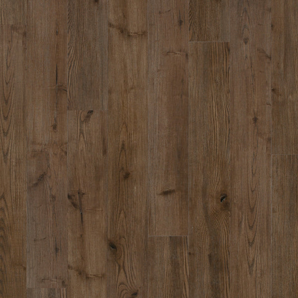 Coretec Originals Classics Vinyl features medium brown planks with visible grain and natural knots. Its matte finish and realistic wood look, paired with a rigid core, deliver rustic style and durable performance.