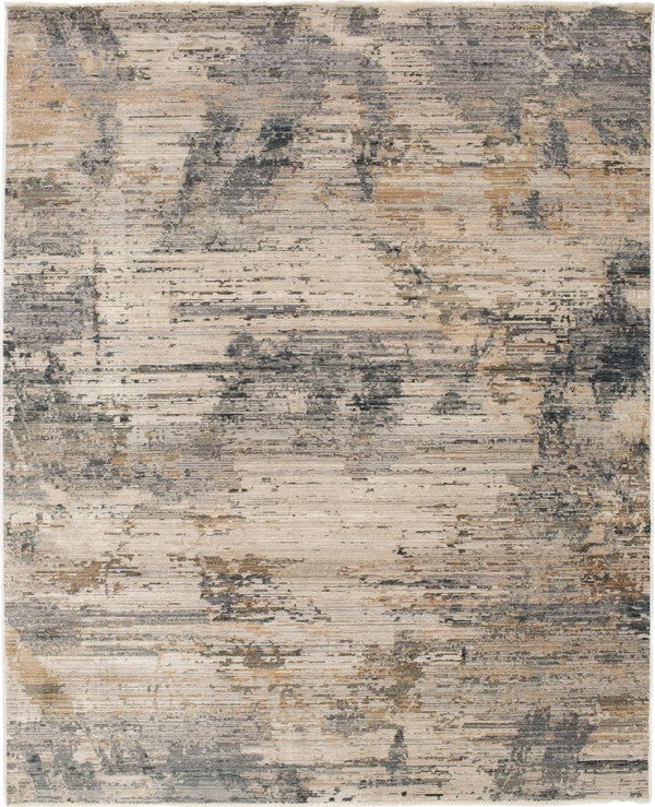 The Echo Area Rug is a rectangular abstract rug with soft beige, gray, blue, and brown tones in a contemporary weathered pattern featuring irregular streaks and ornamental patches.