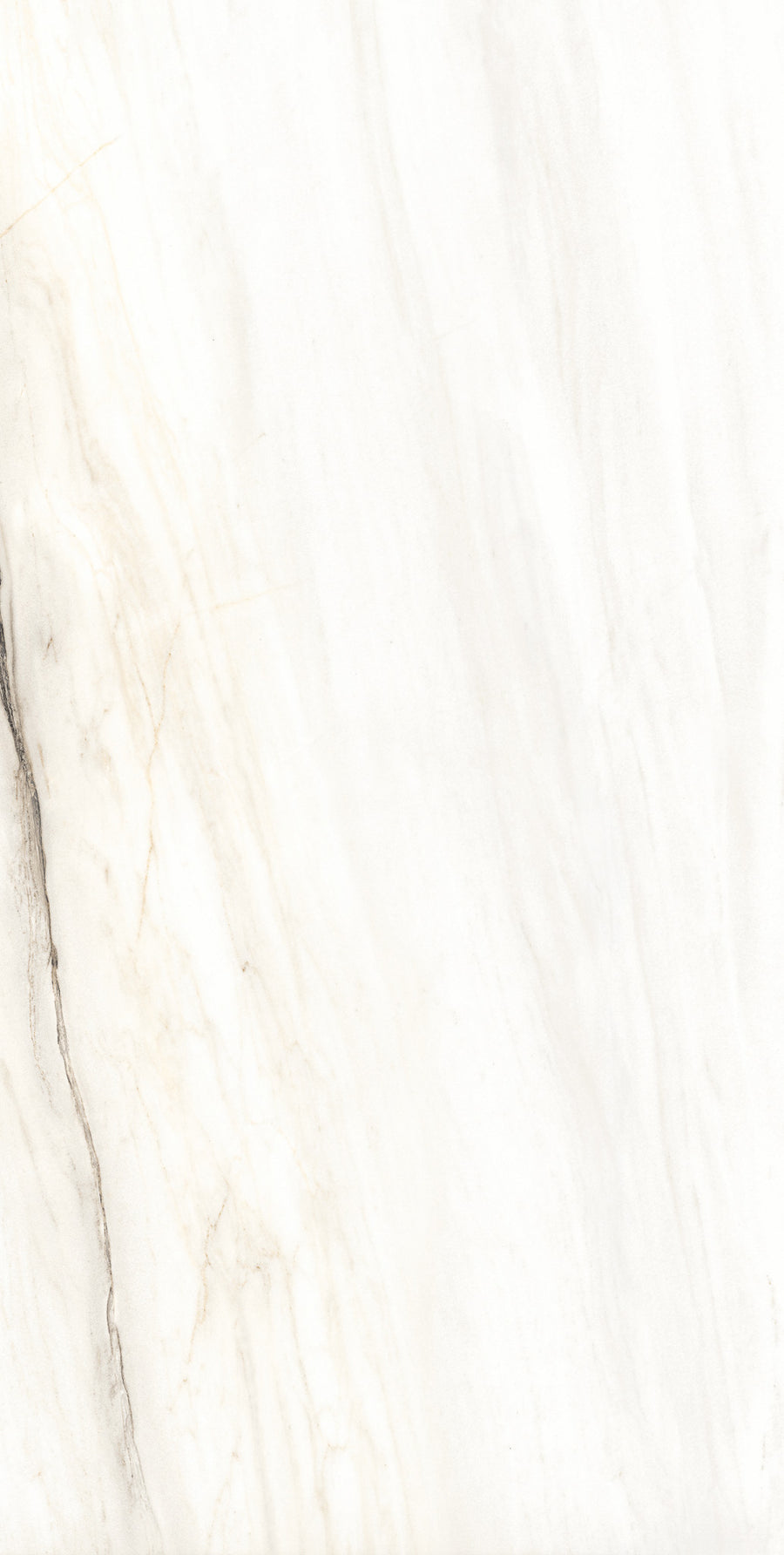 White marble surface with faint, irregular gray and beige veining running diagonally. The texture appears smooth and polished, giving a natural and elegant stone look.