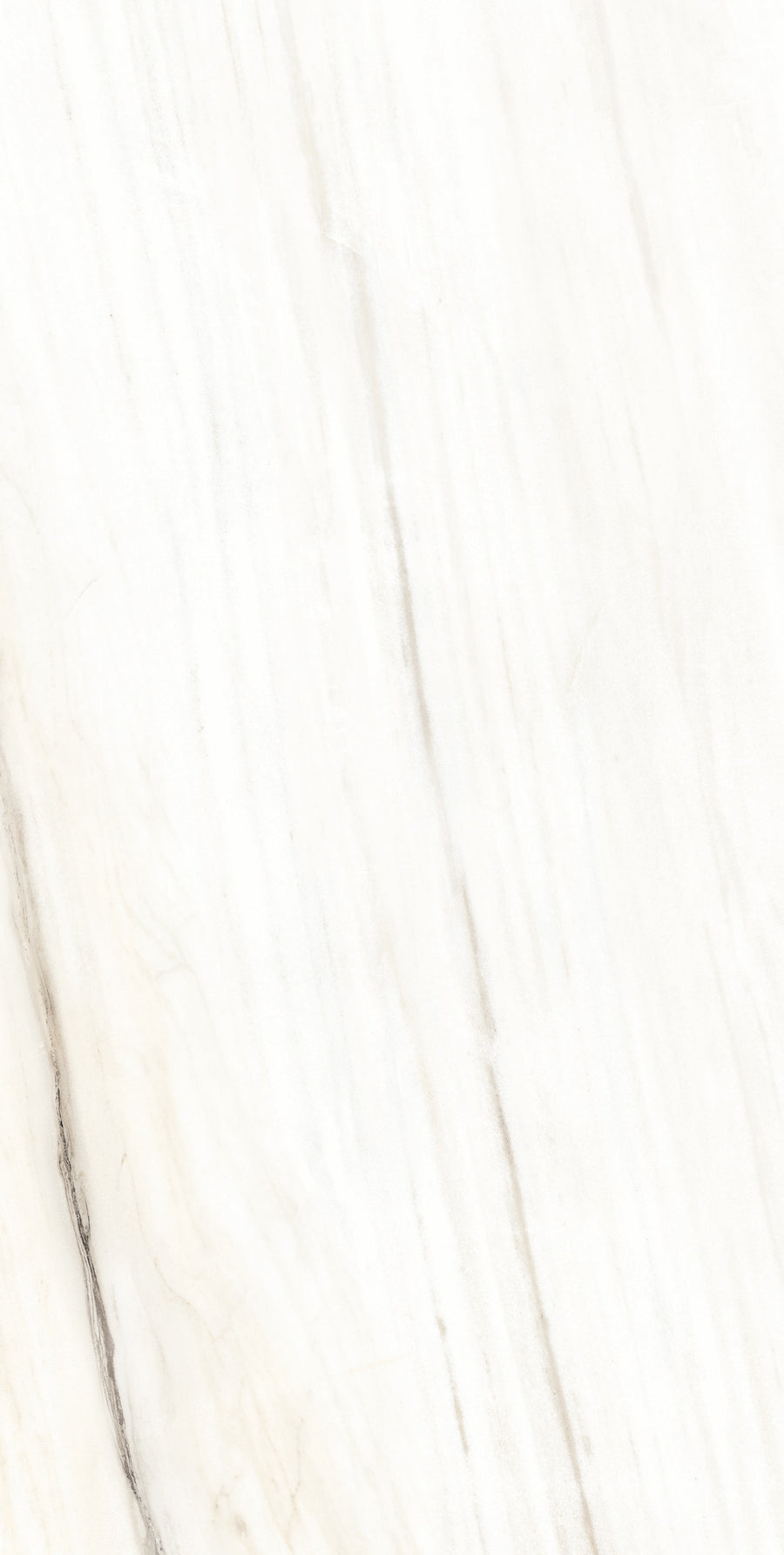 White marble surface with subtle, light gray veins running diagonally. The texture appears smooth and polished, giving a clean and elegant appearance suitable for countertops or flooring.