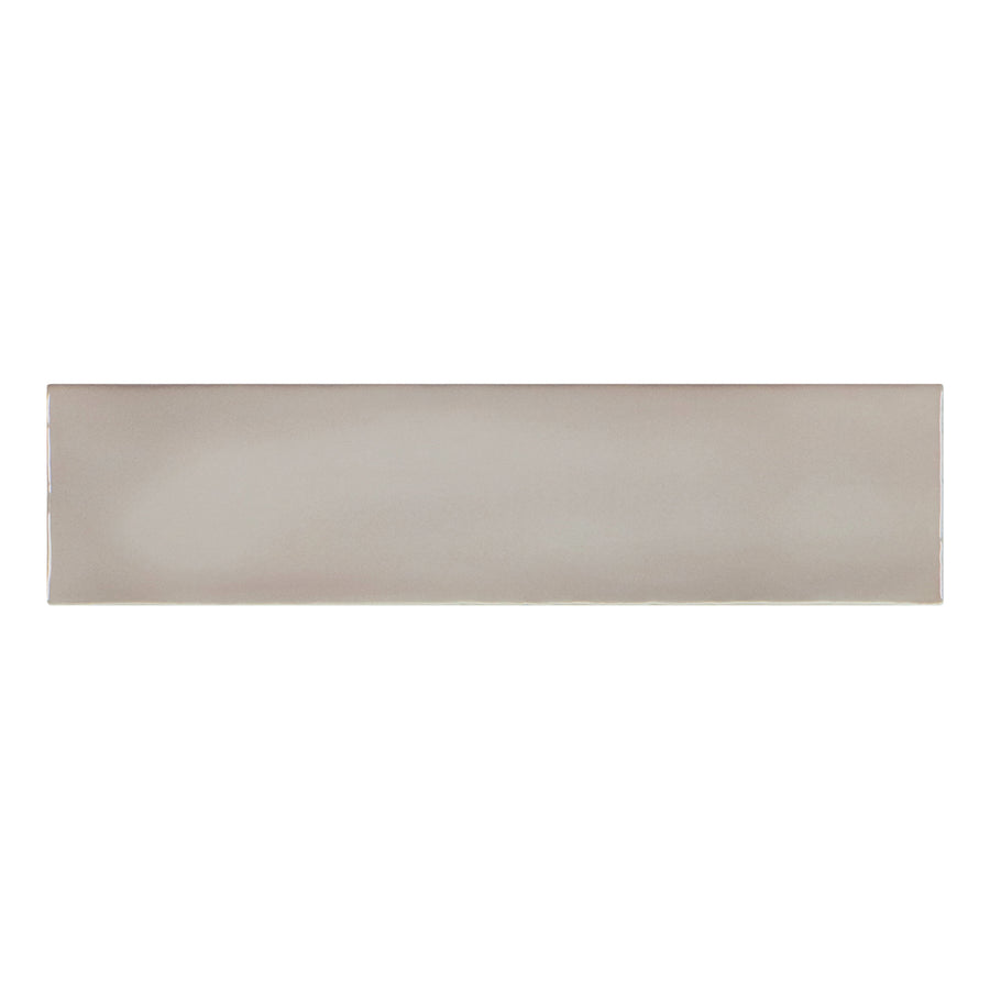 The Brooklyn 3" x 12" Ceramic Subway Tile in Shadow is a rectangular, glossy, light gray tile with smooth edges—ideal for bathroom walls or a kitchen backsplash, shown against a white background.