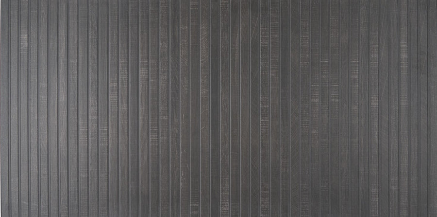 Deja View 24x48 Matte Rectified Porcelain Tile features a dark wood panel look with vertical grooves and subtle grain. Its linear design creates evenly spaced lines for a modern, sleek effect.