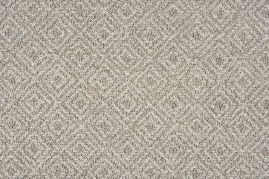 Brentwood Berber Carpet in Nickle color features a textured diamond pattern with repeating geometric shapes, offering an elegant woven look and soft feel.