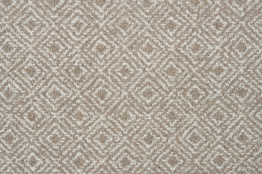 Close-up of Brentwood Berber Carpet in Taupe, featuring a soft woven texture and repeating diamond-shaped geometric pattern in white and light brown. This elegant, durable flooring adds a subtle, neutral touch to any space.