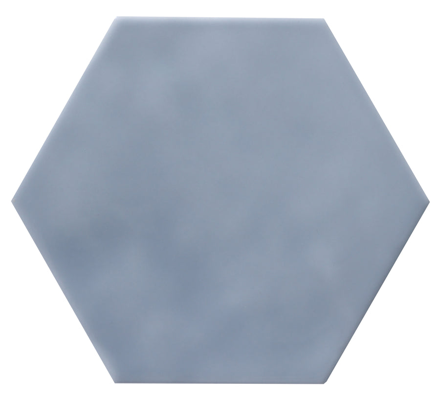 The Zephyr 4.2x4.9 Hexagon Ceramic Tile is shown in gray with a smooth, matte finish and subtle color variations against a white background. Special-order item.