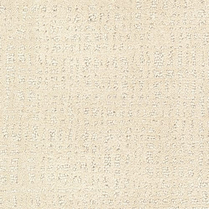 Close-up of Homage Berber Carpet in Baccarat color, featuring a textured, light beige woven surface with a subtle grid pattern and gentle variations—ideal for high-traffic areas.
