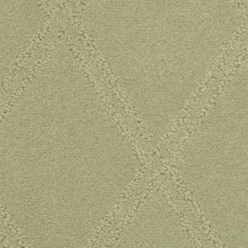 Close-up of the Braided Opulence Berber Carpet in Balsam—a light beige hue featuring a subtle, raised diamond pattern. The soft, plush texture and gentle contrast add understated elegance to any space.