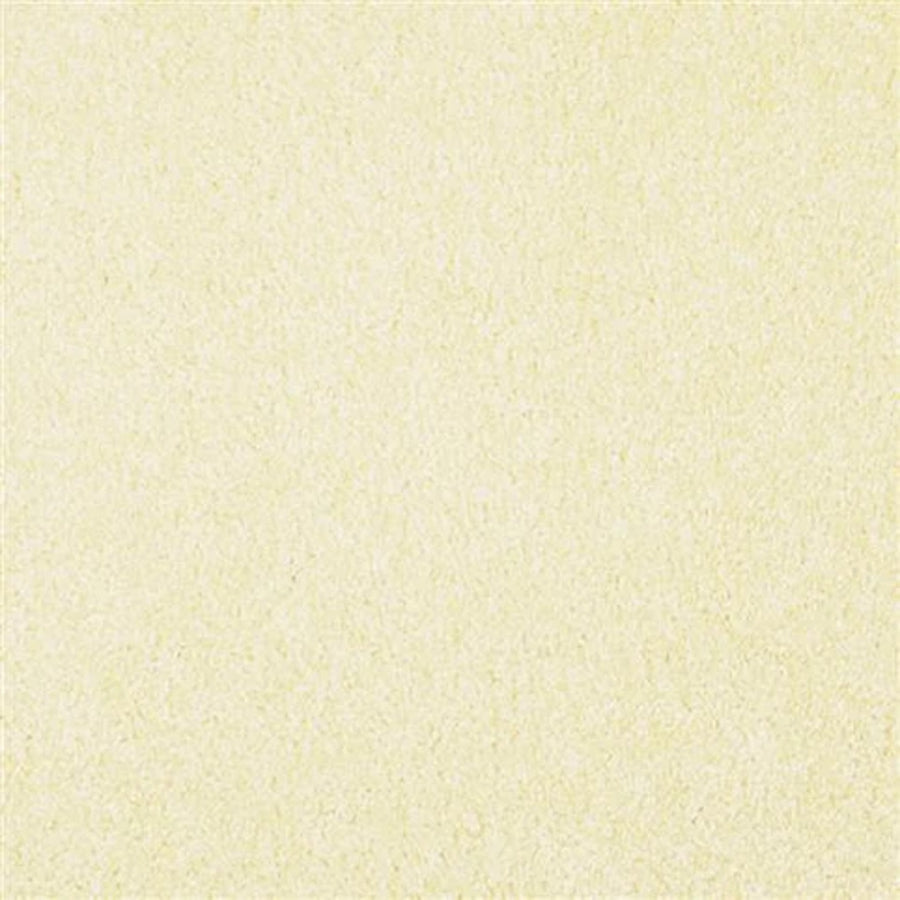 A close-up view of Oceanside Family Friendly Carpet in Banana Cream, showcasing its soft texture, plush feel, uniform light yellow color, and slightly fuzzy appearance.