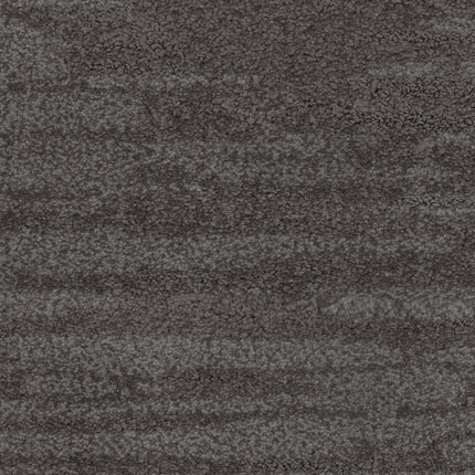 A close-up of Cirrus Berber Carpet in Basalt color, featuring a soft, plush surface with dark gray tones and subtle horizontal pattern variations for a luxurious feel.