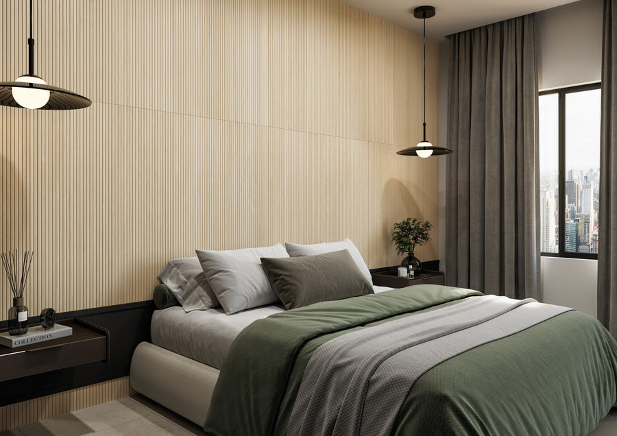 Modern bedroom with a beige wood-paneled wall, large bed with gray and green bedding, two pendant lights, nightstands with decor, gray curtains, and a window showing a cityscape.