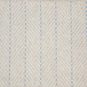 Close-up of Angola Berber Carpet in Beach color, featuring a cream base with blue vertical dashed lines in a herringbone pattern, evoking Angola flooring. The soft, slightly raised texture adds contemporary appeal.