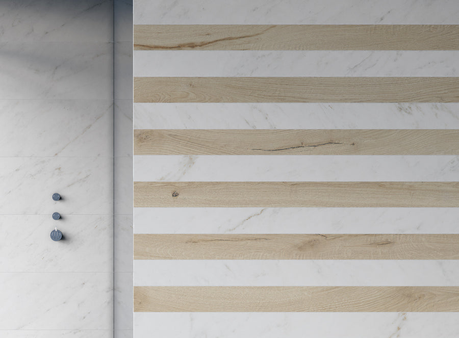 A modern wall with alternating horizontal stripes of light wood and white marble. Three round gray wall hooks are mounted on the left side. The overall look is minimalistic and clean.