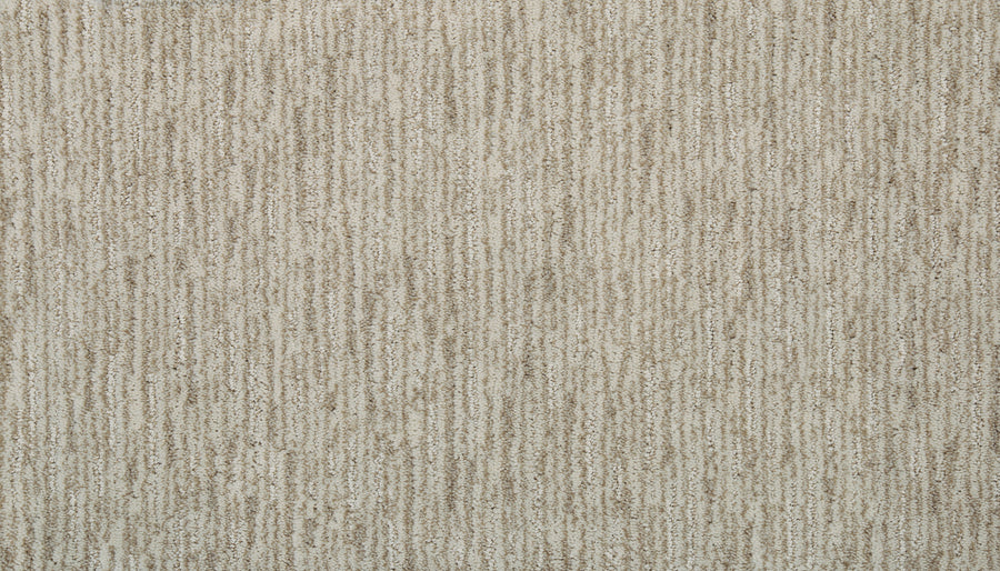 Close-up of Beautiful Elements Pet Friendly Carpet in Bisque, showcasing textured beige with subtle brown and tan stripes—perfect for those wanting durable, luxurious flooring that's also pet friendly.