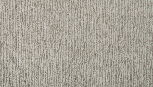 Close-up of Beautiful Elements Pet Friendly Carpet in Yearling, showing a textured surface with vertical, irregular gray lines on a light beige background for an elegant, organic look.