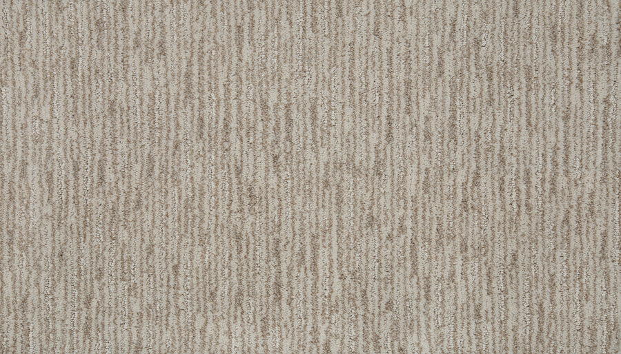Close-up of Beautiful Elements Pet Friendly Carpet in Camellia, featuring a textured beige surface with subtle vertical and horizontal lines in light and dark tones for a luxurious, durable woven look.