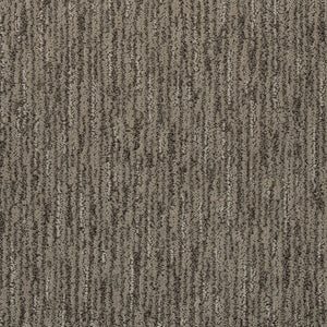 Close-up of Beautiful Elements Pet Friendly Carpet in At Rest, showcasing a textured surface with subtle vertical stripes in brown and beige tones—adding an elegant, luxurious touch to any space.