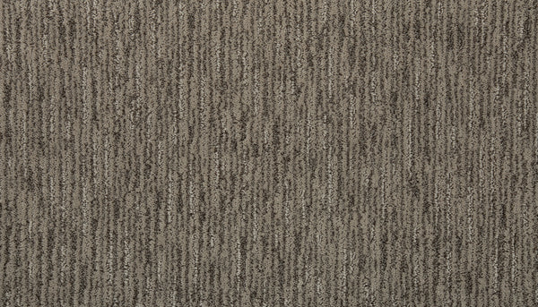 Close-up of Beautiful Elements Pet Friendly Carpet in At Rest, showcasing a textured surface with subtle vertical stripes in brown and beige tones—adding an elegant, luxurious touch to any space.