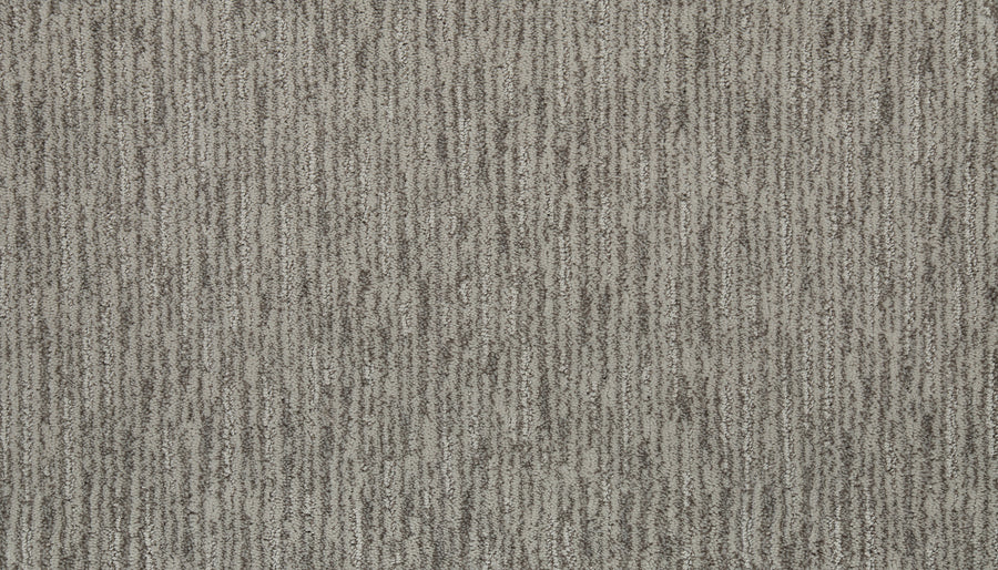 Close-up of Beautiful Elements Pet Friendly Carpet in Starlet, featuring a textured surface with vertical gray and beige stripes—an ideal blend of style, durability, and pet-friendly luxury.