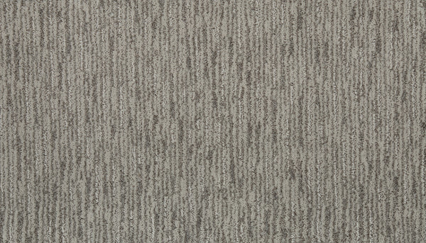 Close-up of Beautiful Elements Pet Friendly Carpet in Starlet, featuring a textured surface with vertical gray and beige stripes—an ideal blend of style, durability, and pet-friendly luxury.
