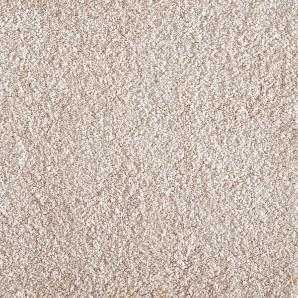 Close-up of Jazzy Family Friendly Carpet in Bisque, featuring a soft, textured surface with tightly packed fibers—ideal for high-traffic areas and providing an elegant, plush look throughout your space.