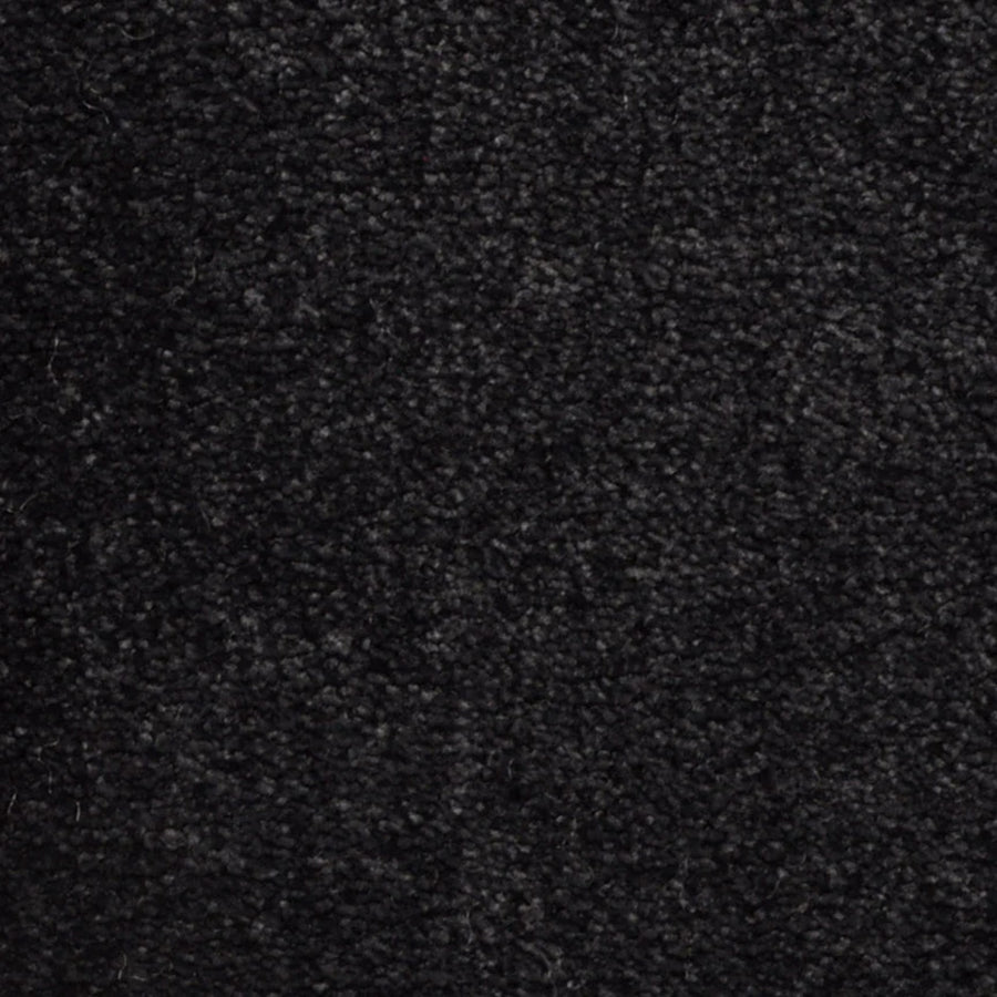 Close-up of Seduction On Trend Carpet in Black Velvet—features a dense, soft, and slightly fuzzy surface with subtle shading variation, offering comfort and elegance to any space.