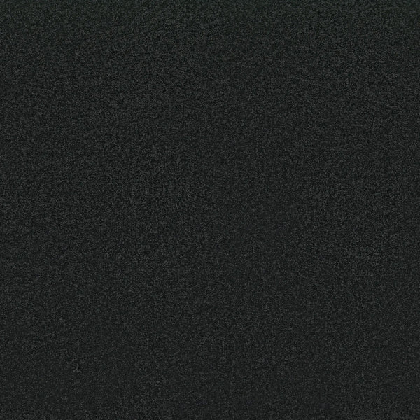 A close-up of Awaken Spirit Pet Friendly Carpet in Blackout reveals a dark, textured surface with a subtle speckled look, blending durability and contemporary style.