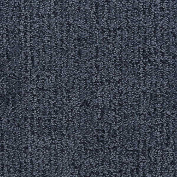 Close-up of Victor Family Friendly Carpet in Blue Ribbon—a durable, dark blue carpet with a subtle linear pattern and tightly woven fibers for a soft, family-friendly surface.