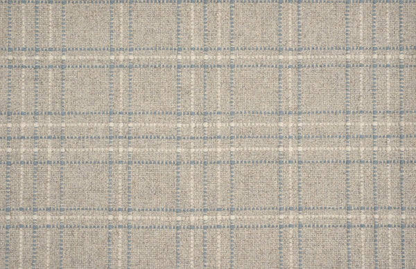 A close-up of Pristine Plaid Berber Carpet in Bluestone, showcasing its textured plaid pattern with intersecting lines—perfect for adding durability and sophistication to any space.