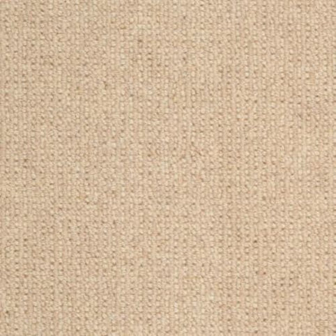 Dublin Berber Carpet in Brennan features a beige woven fabric with a subtle, textured surface and small, evenly spaced threads, offering a soft, neutral background reminiscent of premium Berber flooring.