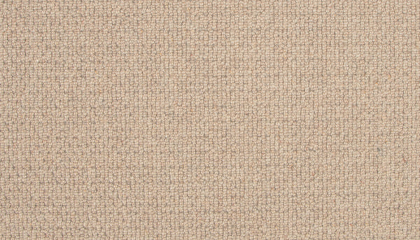 Close-up view of the Brixham Berber Carpet in Honeycomb, featuring small, tightly woven loops and a uniform, textured surface—a stylish and durable flooring option.