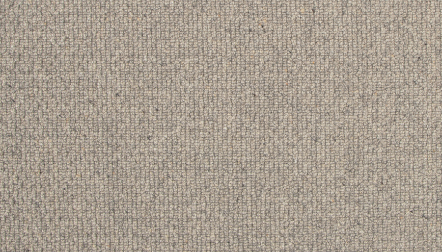 Close-up of the Brixham Berber Carpet in Smoked Pearl, highlighting its tightly woven, textured surface with small, evenly spaced fibers that create a subtle grid-like pattern.