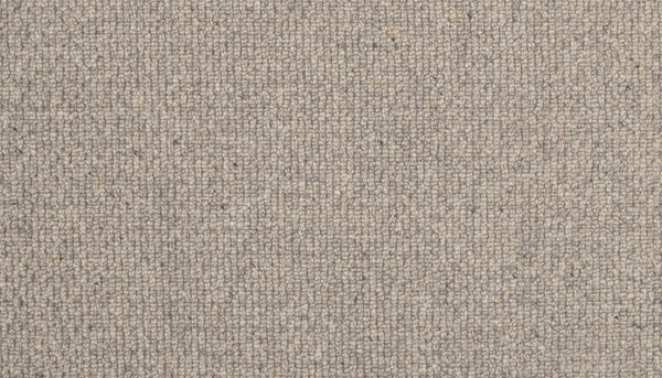 Close-up of the Brixham Berber Carpet in Smoked Pearl, highlighting its tightly woven, textured surface with small, evenly spaced fibers that create a subtle grid-like pattern.