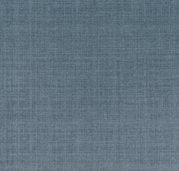 A close-up of the Brushed Linen On Trend Carpet in Baltic Blue highlights its contemporary design, featuring a subtle woven pattern and a blend of lighter and darker threads for a soft, grid-like look.