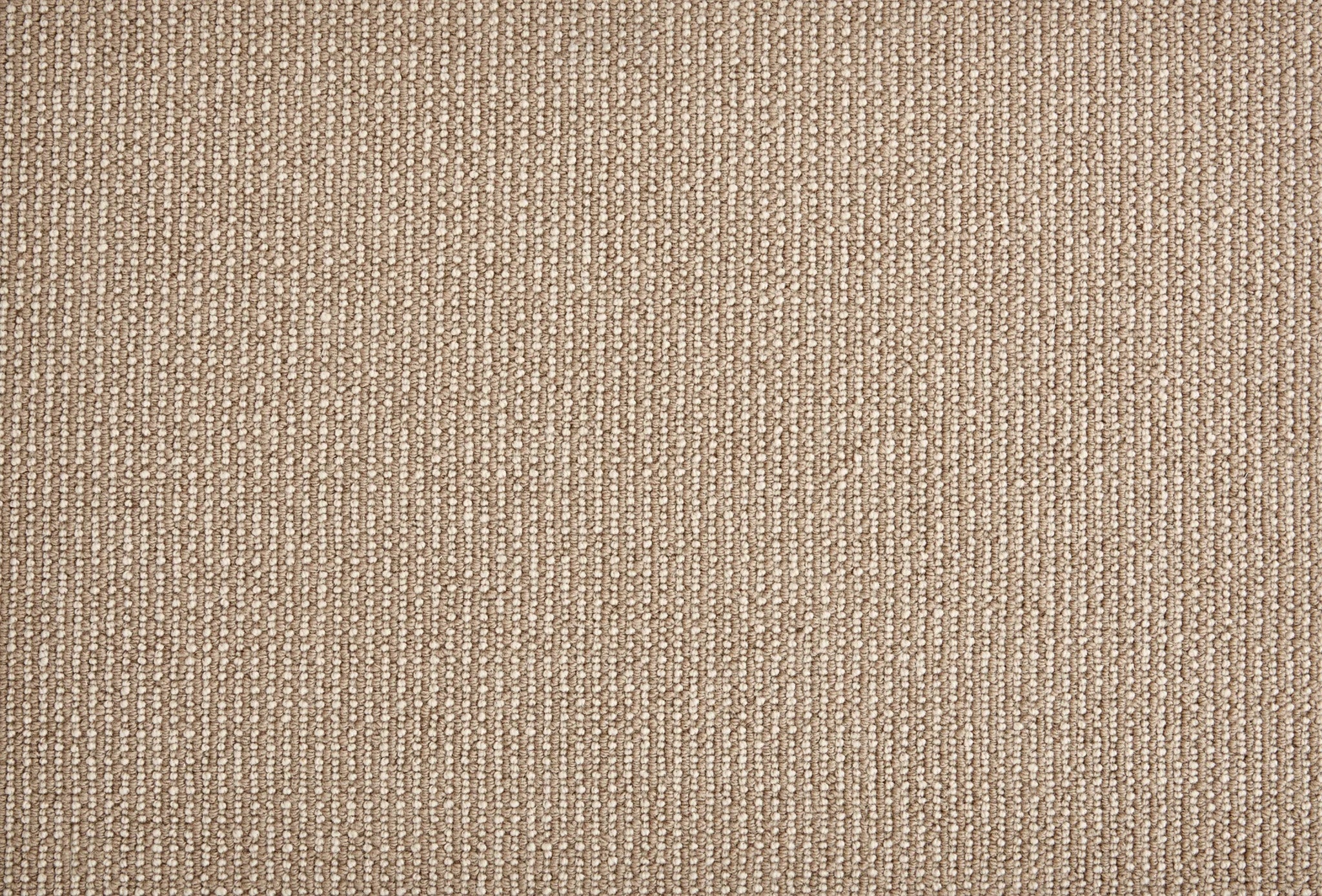 
		                            Close-up of Harper Berber Carpet in Buff—a beige, textured surface with subtle vertical stripes and a woven pattern. This soft, uniform carpet offers everyday durability and comfort, making it ideal for any space.
		                            