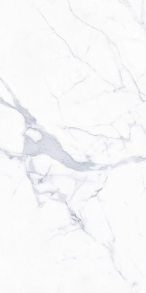 White marble surface with subtle light gray veins and natural patterns running across it, creating an elegant and smooth texture.