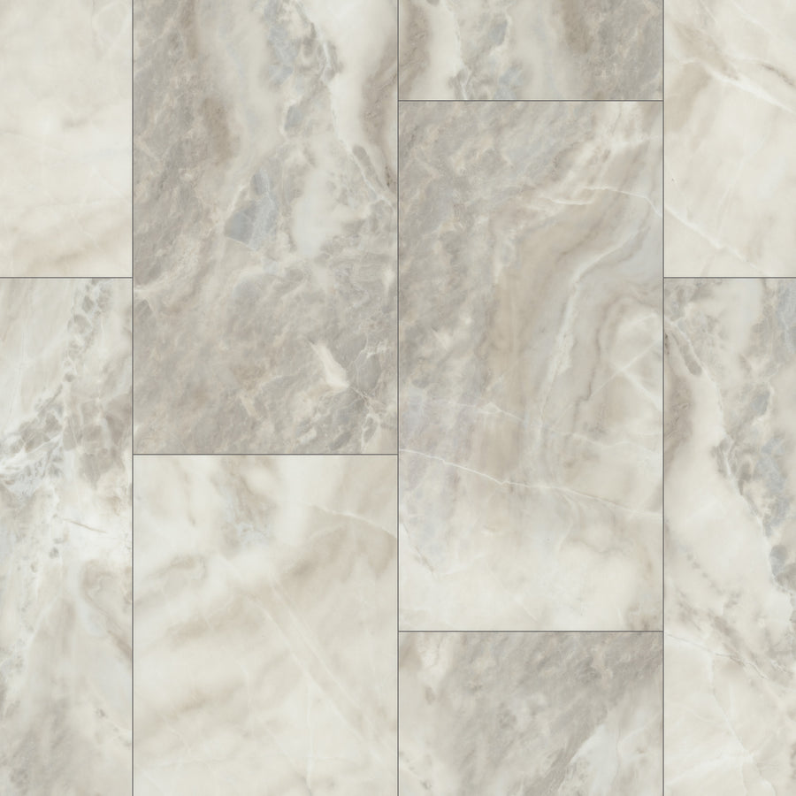 A close-up of Paragon Tile Plus Vinyl shows rectangular tiles with a marbled pattern in light gray, beige, and white, featuring natural stone-like veining and a smooth surface, arranged in a staggered layout.