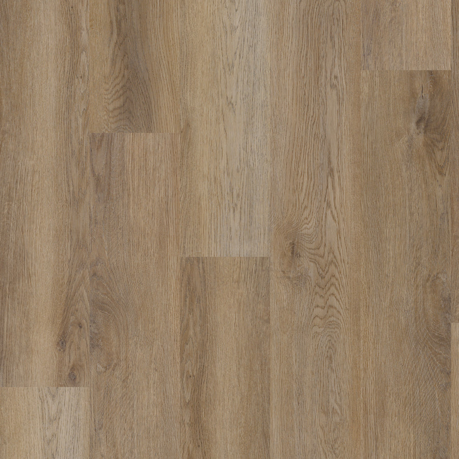 Close-up view of Coretec Pro Plus Vinyl flooring, showcasing natural brown grain patterns and a smooth, polished finish with rigid core planks arranged in a staggered layout.