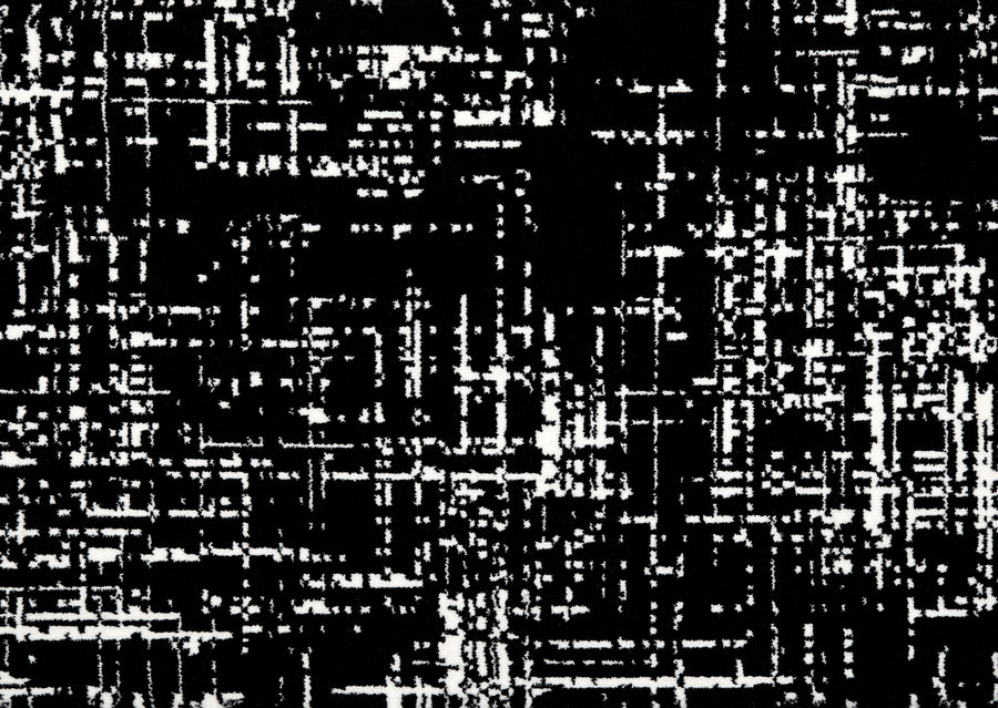 The Black & White On Trend Carpet in Midnight features an abstract grid pattern with intersecting lines, evoking a luxurious, textured look with varying thicknesses and densities.