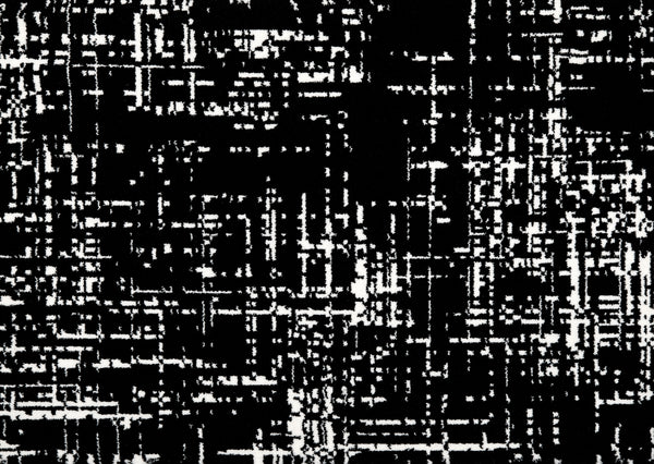 The Black & White On Trend Carpet in Midnight features an abstract grid pattern with intersecting lines, evoking a luxurious, textured look with varying thicknesses and densities.