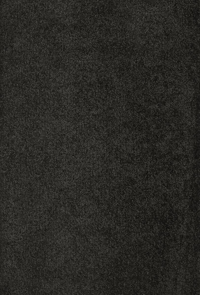 A close-up view of Divine Family Friendly Carpet in Midnight—a dark, textured surface resembling stone—perfect for luxury flooring that offers both style and durability.