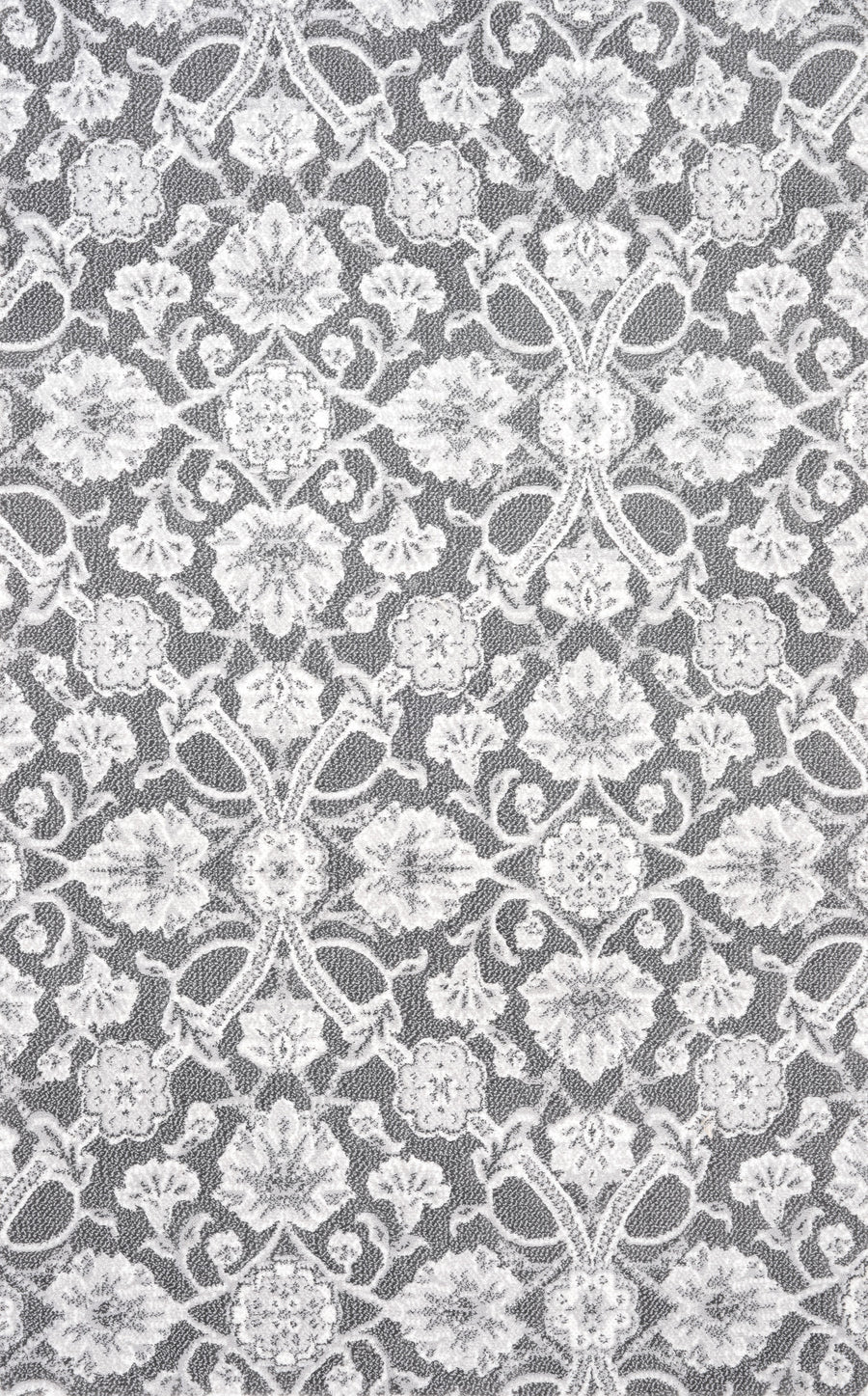 Vivar On Trend Carpet in Oyster features a delicate, symmetrical floral lace pattern with intricate flowers and leaves. The detailed, modern design repeats evenly across the surface for a contemporary look.