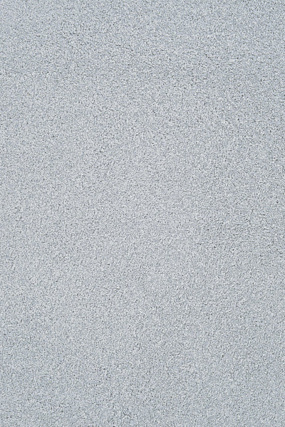 Close-up of the Heavenly Family Friendly Carpet in Pacific, featuring a light gray, textured surface with a uniform and soft look—perfect for any home.