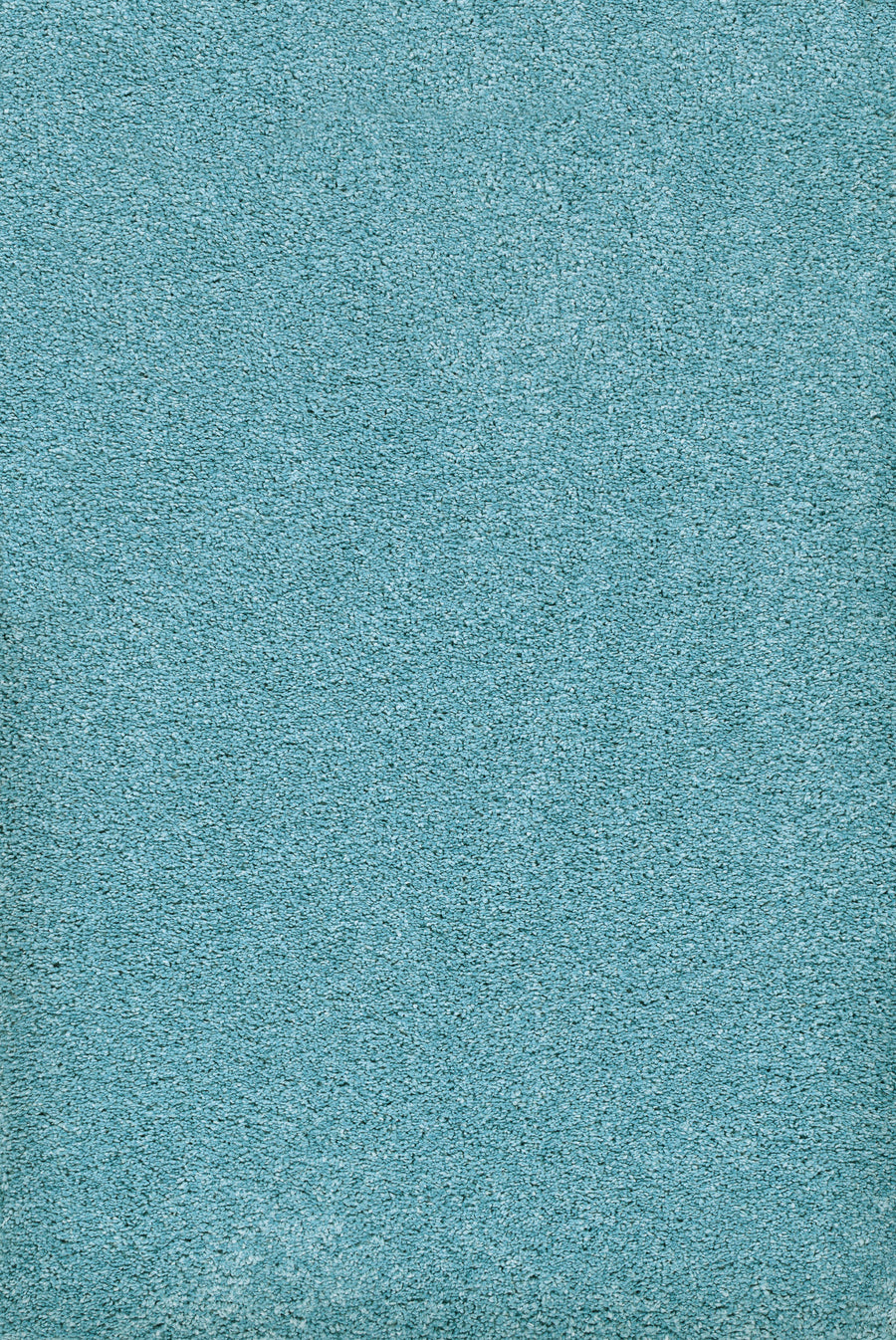 Close-up of Teal Heavenly II Family Friendly Carpet shows its dense, soft, and even texture—perfect for high-traffic homes.