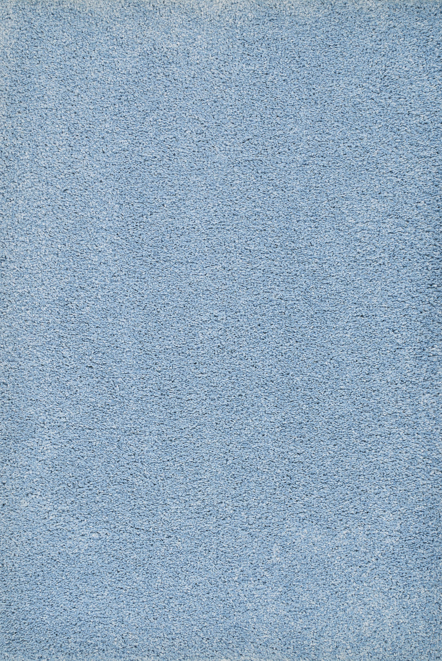 A close-up of Heavenly II Family Friendly Carpet in Powder Blue, highlighting its soft, dense texture and subtle color variations—ideal for busy homes seeking elegant, durable flooring.