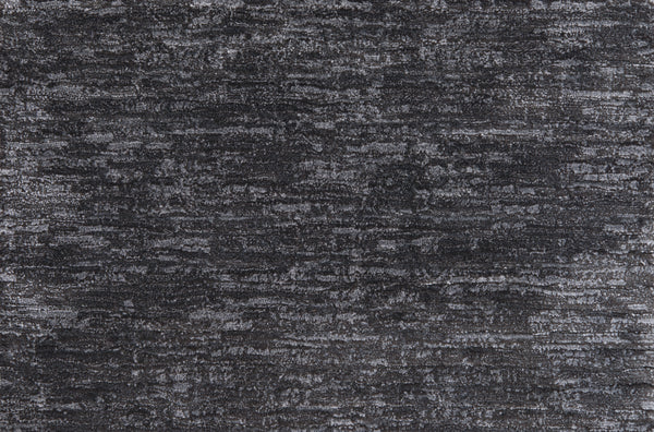 Olde Chatham On Trend Carpet in Charcoal offers a dark gray, textured surface with subtle, uneven patterns that evoke stone or fabric—its sophisticated look and durable finish make it ideal for luxury spaces and high-traffic areas.