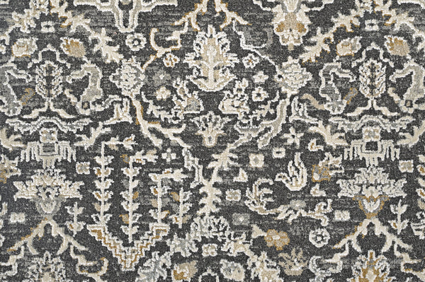 The Persian Damask On Trend Carpet in charcoal features intricate, symmetrical floral and geometric patterns, adorned with stylized leaves, flowers, and vines in a traditional design.
