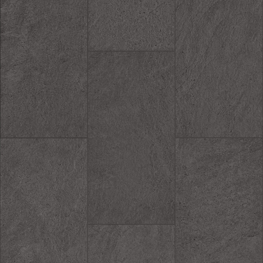 Paragon Tile Plus Vinyl features dark gray textured tiles in a staggered layout, each with subtle shading variations and a natural stone-like look.
